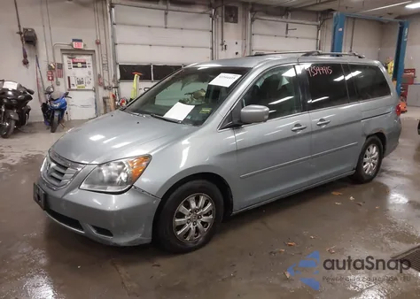 2010 Honda Odyssey Ex z USA, uszkodzony, nr VIN 5FNRL3H46AB066627